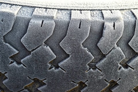 Hoarfrost on a rubber tire wheel. Krasnodar, Russia