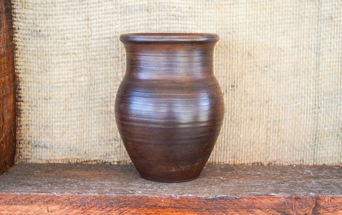 Clay pot on a shelf. Taman, Krasnodar Krai, Russia