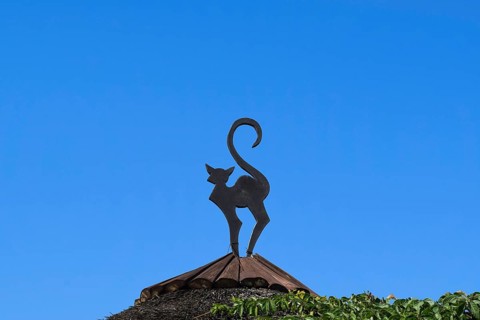 Figure of a cat on a roof. Taman, Krasnodar Krai, Russia