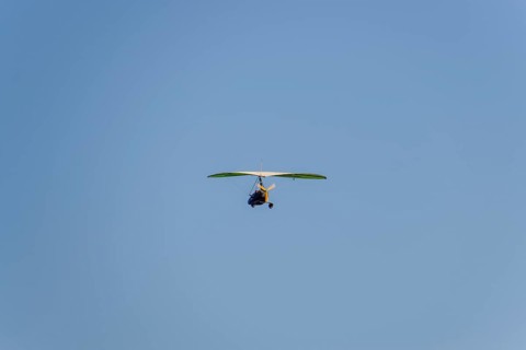 Trike, flying in the sky with two people. Atyrau, Kazakhstan