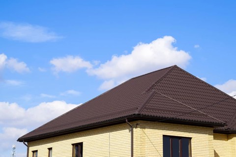 Decorative metal tile on a roof. Atyrau, Kazakhstan