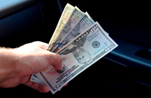 Hand transmitter dollars. Atyrau, Kazakhstan