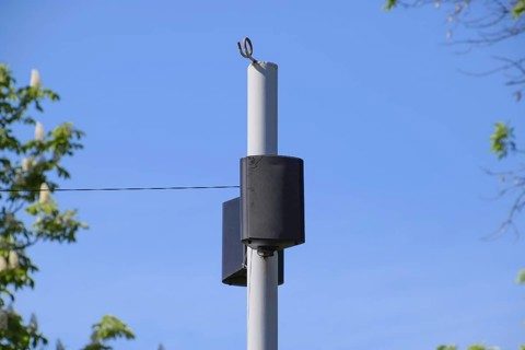 The loudspeaker on the pole. Outdoor speakers for fun walking in the park. Atyrau, Kazakhstan