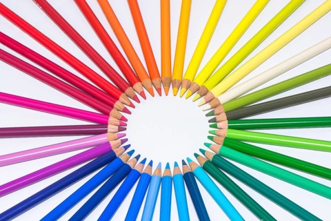 Isolated Circle Of Colorful Crayons