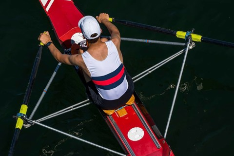 View From Above On Single Rower In Racing Boat During Training, Austria