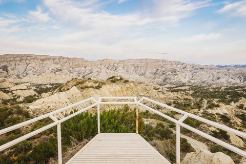 Viewpoint platform with no people and tourist in Vashlovani national park. Rock formations in
