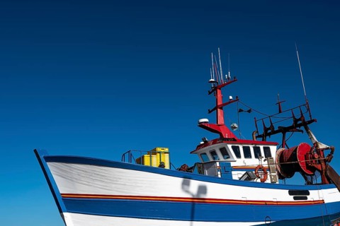 Fishing Boat In The Harbor Docks Of Finistere City Guilvinec At The Coast Of Atlantic In Brittany,