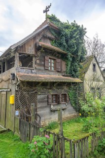 Old wooden house overgrown with ivy, Cigoc, Sisak-Moslavina County, Croatia
