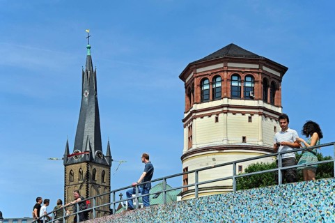 Rhine embankment promenade, Rhine embankment promenade with St. Lambertus Church and castle tower,
