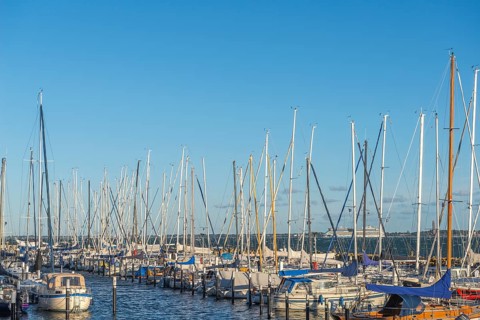 Strande marina near Kiel, Rendsburg-Eckernförde district, AIDA, ship masts, dolphins, Baltic Sea,