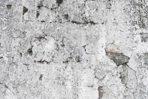 Weathered grey wall with cracks and visible texture, Hesse, Germany