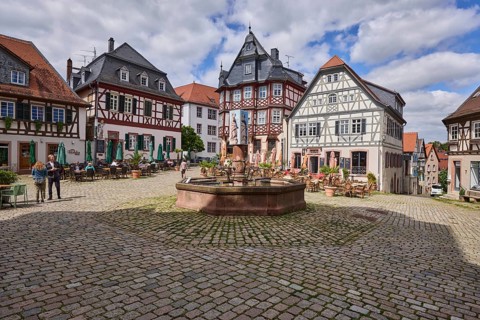 Old town, historic half-timbered houses, stone fountain, market fountain, cobblestone square,