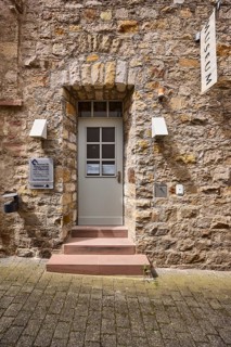 Museum for town history and folklore, sandstone building, town museum, entrance, door, staircase,