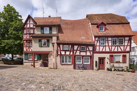 Old town, historic half-timbered houses, building, pointed roof with red roof tiles, tree,