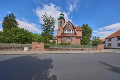 Chapel of the motherhouse St. Vinzent, tower, tower clock, trees, blue sky, cumulus clouds,