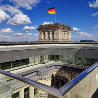 Viewing platform with a German flag in the wind on one of the corner towers and a view of an inner