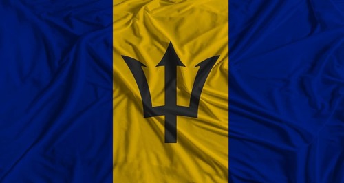 Barbadian flag with fabric texture background. National flag of Barbados