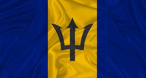 Flag of Barbados with cloth texture. Close up of Barbados flag waving