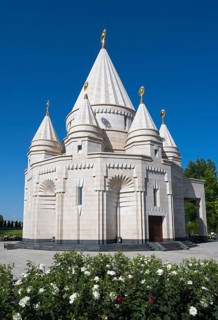 Magnificent temple with white domes surrounded by rose garden, Yazidi temple, Yazidi temple, the