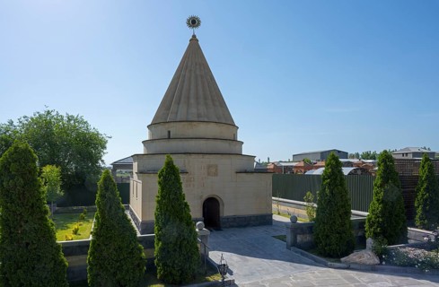 Temple with cone-shaped roof surrounded by a well-tended garden, Yazidi temple, Yazidi temple,