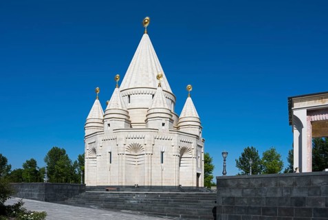 White temple with towers and domes under a clear blue sky, Yazidi temple, Yazidi temple, the