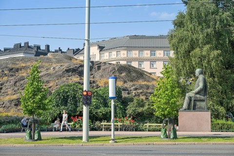 Street scene, passers-by, Kyösti Kallio statue, Mannerheimintie, Helsinki, Finland