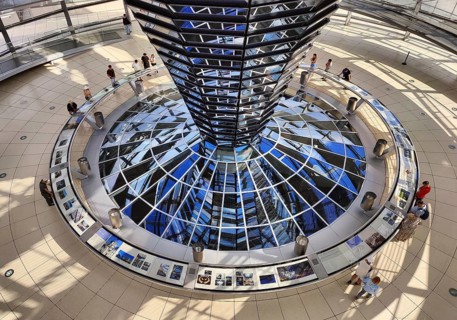 Reichstag dome, interior view from top to bottom of the mirror cone with visitors, Reichstag