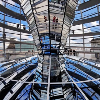 Interior view of the Reichstag dome with the mirror cone and visitors, Reichstag building,