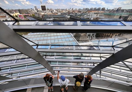 Interior view of the Reichstag dome with visitors on the ramp and view of the cityscape, Reichstag