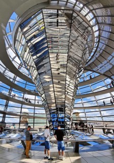 Interior view of the Reichstag dome with the mirror cone and visitors, Reichstag building,