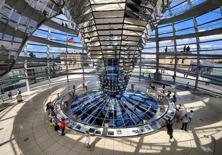 Interior view of the Reichstag dome with the mirror cone and visitors, Reichstag building,