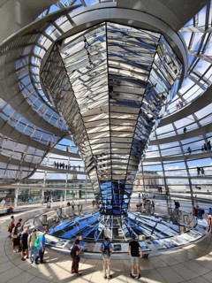 Interior view of the Reichstag dome with the mirror cone and visitors, Reichstag building,