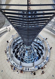 Reichstag dome, interior view from top to bottom of the mirror cone with visitors, Reichstag