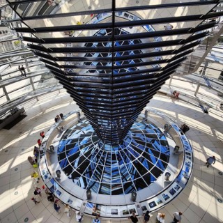 Reichstag dome, interior view from top to bottom of the mirror cone with visitors, Reichstag