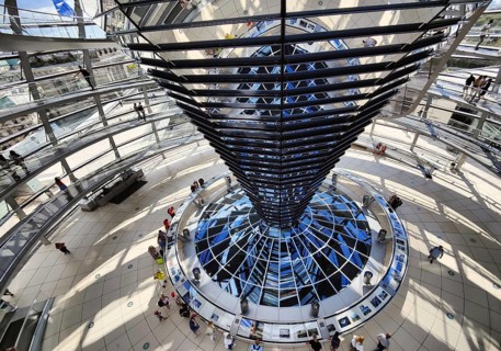 Reichstag dome, interior view from top to bottom of the mirror cone with visitors, Reichstag
