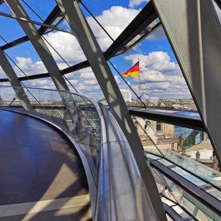 Interior view of the Reichstag dome with a view of a German flag without people, Reichstag