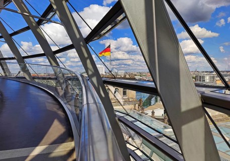 Interior view of the Reichstag dome with a view of a German flag without people, Reichstag