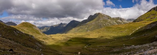 Panorama from Passo del Sole to Passo dell'Uomo and Alpe Carorescio with Piano Grande plateau,