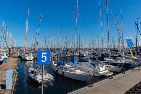Olympic harbour Schilksee, Olympic Games 1972, sailing yachts at the jetty, flag sailing school,