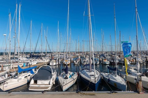 Olympic harbour Schilksee, Olympic Games 1972, sailing yachts at the jetty, flag sailing school,