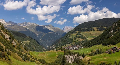 View over Val Medel, behind the village of Curaglia and Surselva, Lukmanier, Grisons, Switzerland