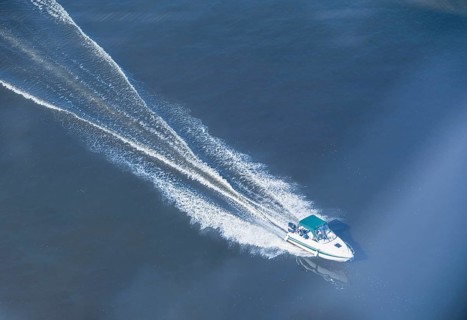 A speedboat moves along the Volga River, selective focus, Nizhny Novgorod, Russia