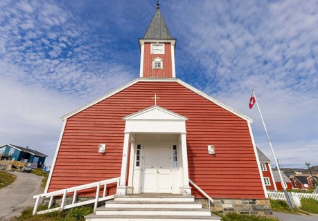 Panoramic view of Greenland capital Nuuk with church and colored houses located near fjords and