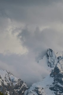 Rising clouds and detailed view of the Sorapis mountain group, Punta Sorapiss, Dolomites, South