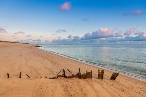 Sunrise on Ellenbogen beach, breakwater, coastal protection, North Sea island of Sylt