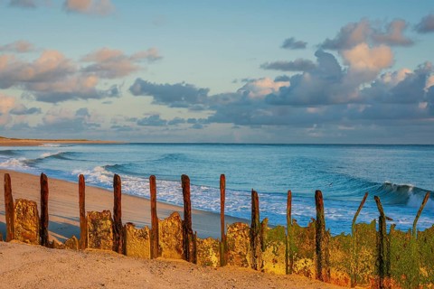 Sunrise on Ellenbogen beach, breakwater, coastal protection, North Sea island of Sylt