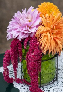 Small bouquet with dahlias and foxtail in a green glass vase, North Rhine-Westphalia, Germany
