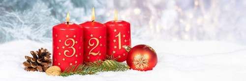 Third 3rd Advent Candle for Christmas Panorama Christmas Card in Winter with copy space Copyspace