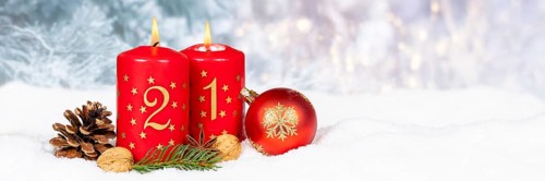 Second 2nd Advent candle for Christmas Christmas card in winter panorama with text free space