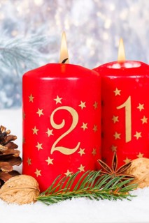 Second 2nd Advent candle for Christmas Christmas card in winter with copy space Copyspace in